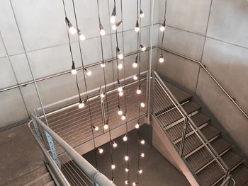 Low angle view of illuminated staircase in building