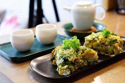 Close-up of breakfast served on table