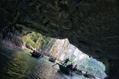 Scenic view of sea seen through cave