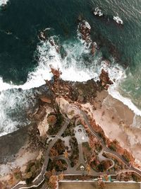 High angle view of road by sea