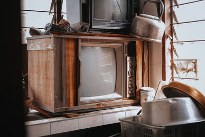 Old-fashioned television sets in room at home