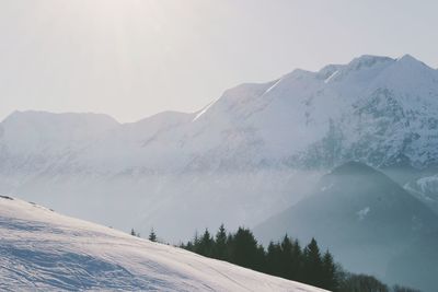 Scenic view of snowcapped mountains against sky