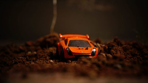 Close-up of toy car on field