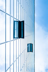 Low angle view of modern building against sky