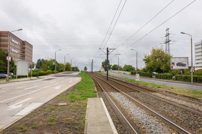 Railroad tracks against sky