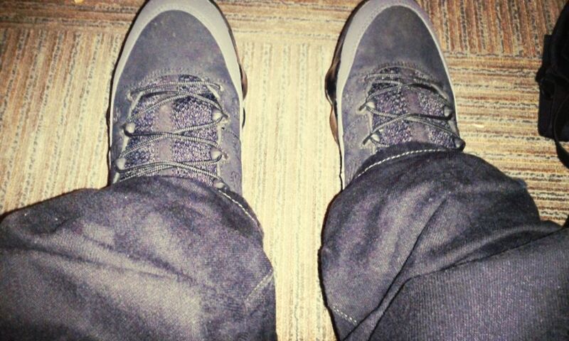 low section, shoe, person, jeans, personal perspective, footwear, standing, human foot, indoors, men, lifestyles, high angle view, canvas shoe, casual clothing, unrecognizable person, denim, relaxation