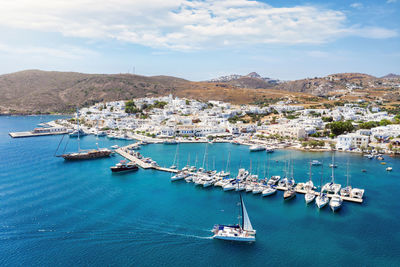 High angle view of sailboats in sea against sky