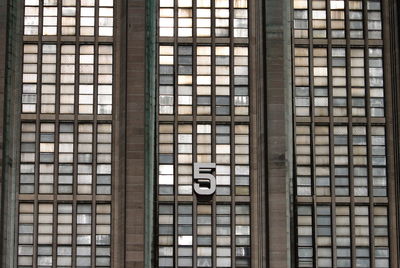 Full frame shot of building seen through window