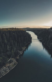 High angle view of river against sky at sunset