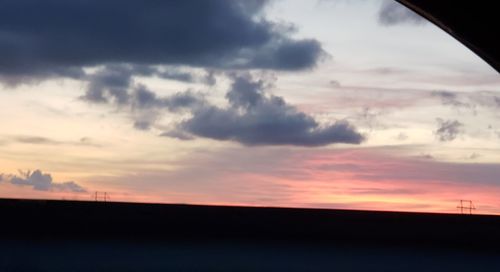 Scenic view of silhouette landscape against sky during sunset