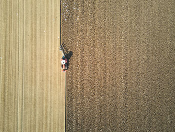 A lone farmer ploughing in east yorkshire, uk