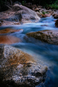 Stream flowing through rocks
