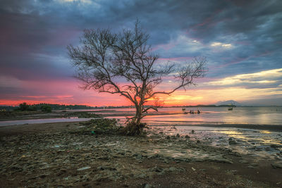 Scenic view of sea against dramatic sky
