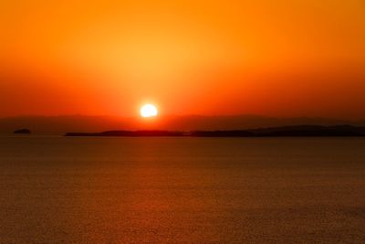 Scenic view of silhouette landscape against romantic sky at sunset