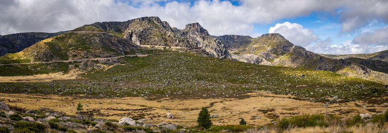 Panoramic view of landscape and mountains against sky