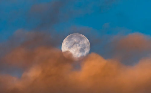 Low angle view of moon against sky