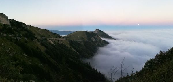 Scenic view of mountains against sky during sunset