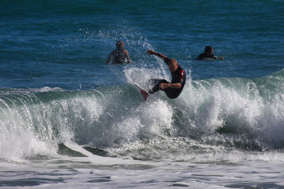 Man surfing in sea