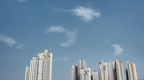 Low angle view of skyscrapers against sky