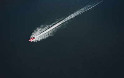 High angle view of ship sailing in sea