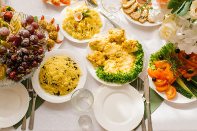 Banquet table with food and snacks at a wedding, birthday or party