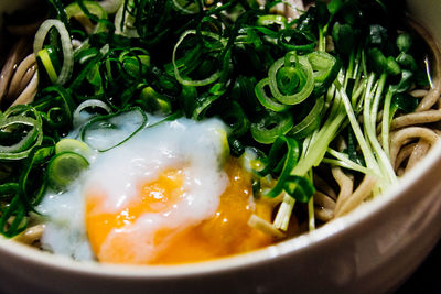 Directly above shot of noodles with egg and vegetables in bowl