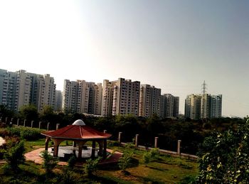 Modern cityscape against clear sky