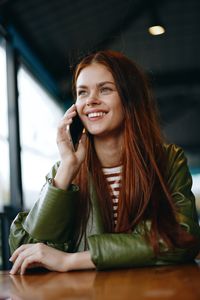 Young woman using mobile phone