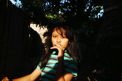 Portrait of cute girl looking away