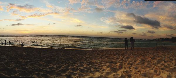 Scenic view of sea at sunset