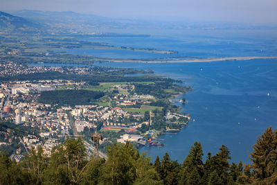 High angle view of townscape by sea