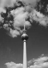 Low angle view of communications tower against sky