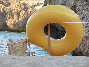 Yellow umbrella on beach