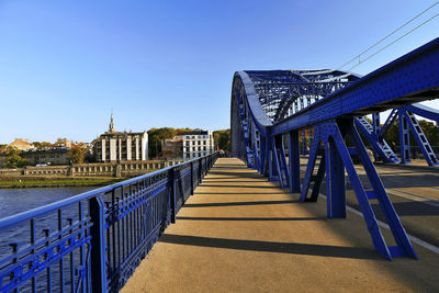 Bridge over river against clear sky