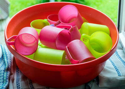 School kitchen canteen, colored plastic cups, canteen equipment, catering establishment,