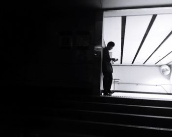 Man standing in corridor
