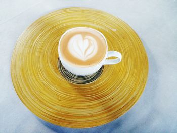 High angle view of coffee cup on table