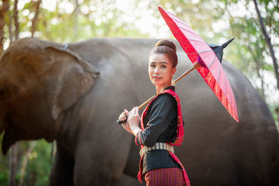 Young woman standing outdoors