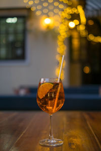 Close-up of wineglass on table