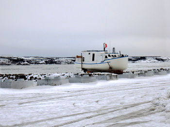 Scenic view of sea against sky during winter