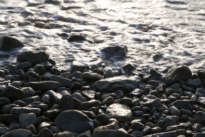 High angle view of stones on beach