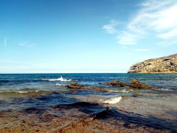 Scenic view of sea and blue sky