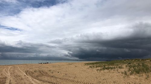 Scenic view of beach against sky