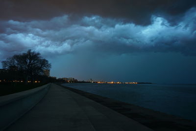 Scenic view of sea against sky at night