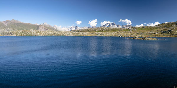 Scenic view of sea against blue sky