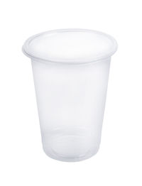 Close-up of empty glass against white background