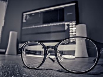 Close-up of eyeglasses on table