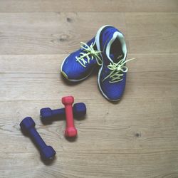 High angle view of shoes on wooden table