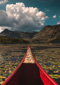 Scenic view of lake against mountain range