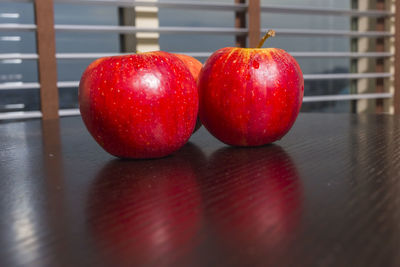 Close-up of apples on table